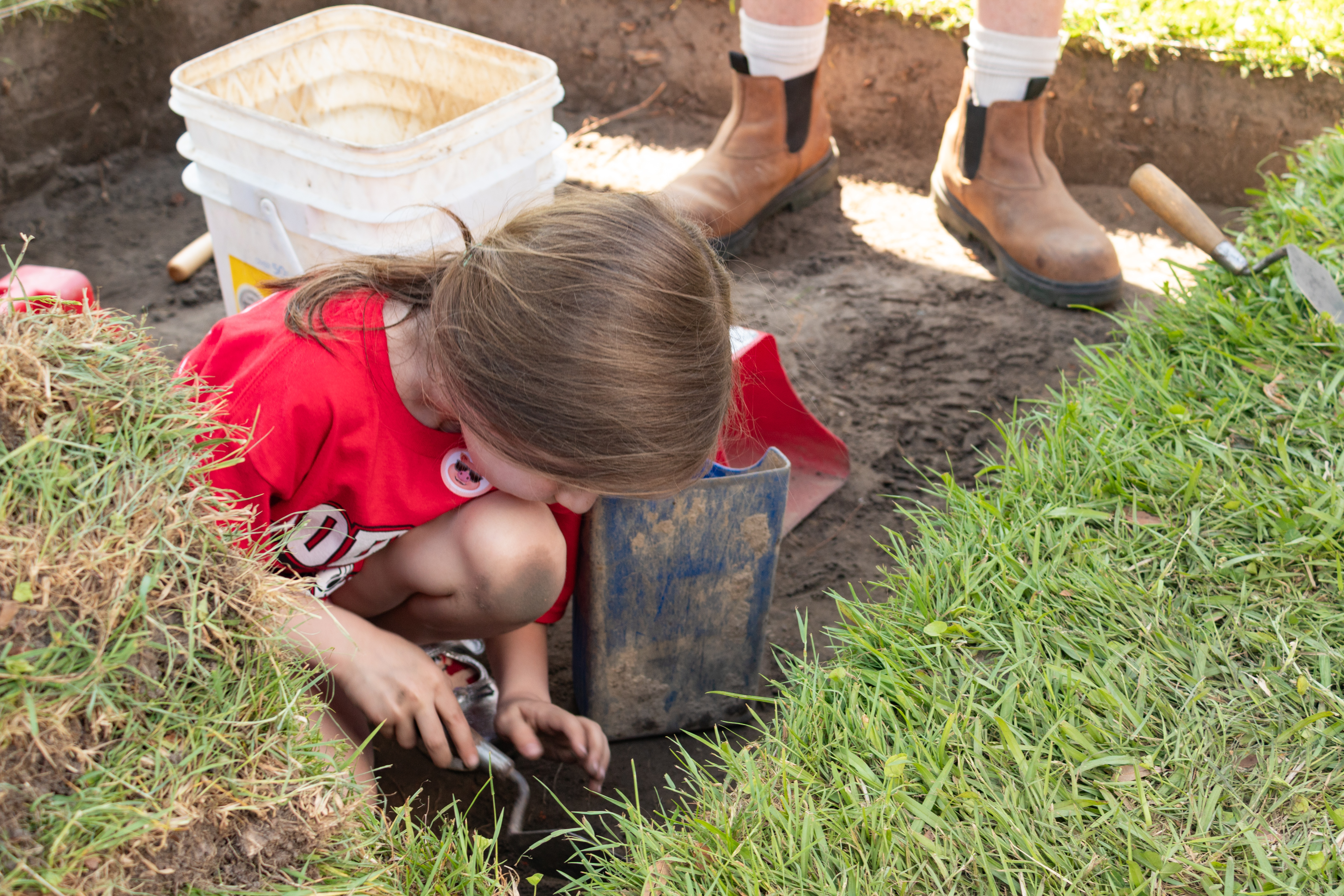 Families enjoying May Faire activities